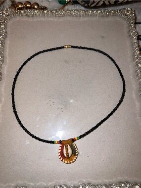 Handmade Black Beaded Necklace with Brown Shell Pendant